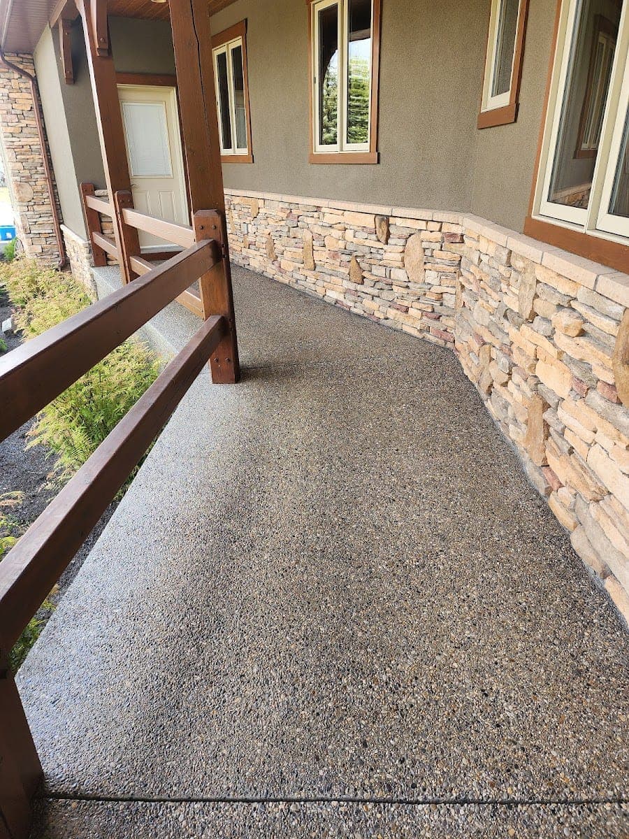 Freshly sealed exposed-aggregate walkway
